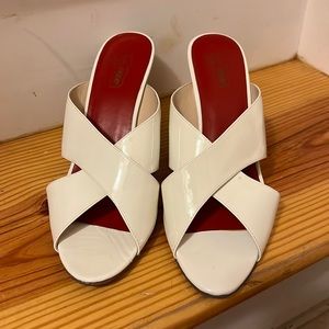 White patent genuine leather sandals with leopard print wedge.